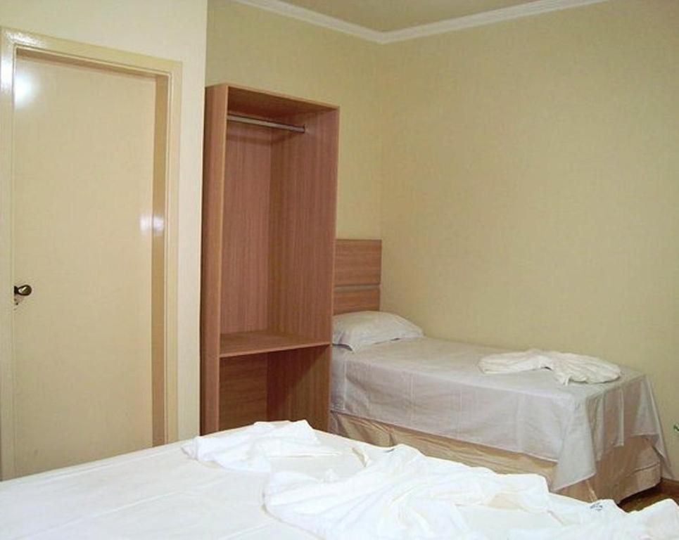Hotel Perez Pouso Alegre Kamer foto